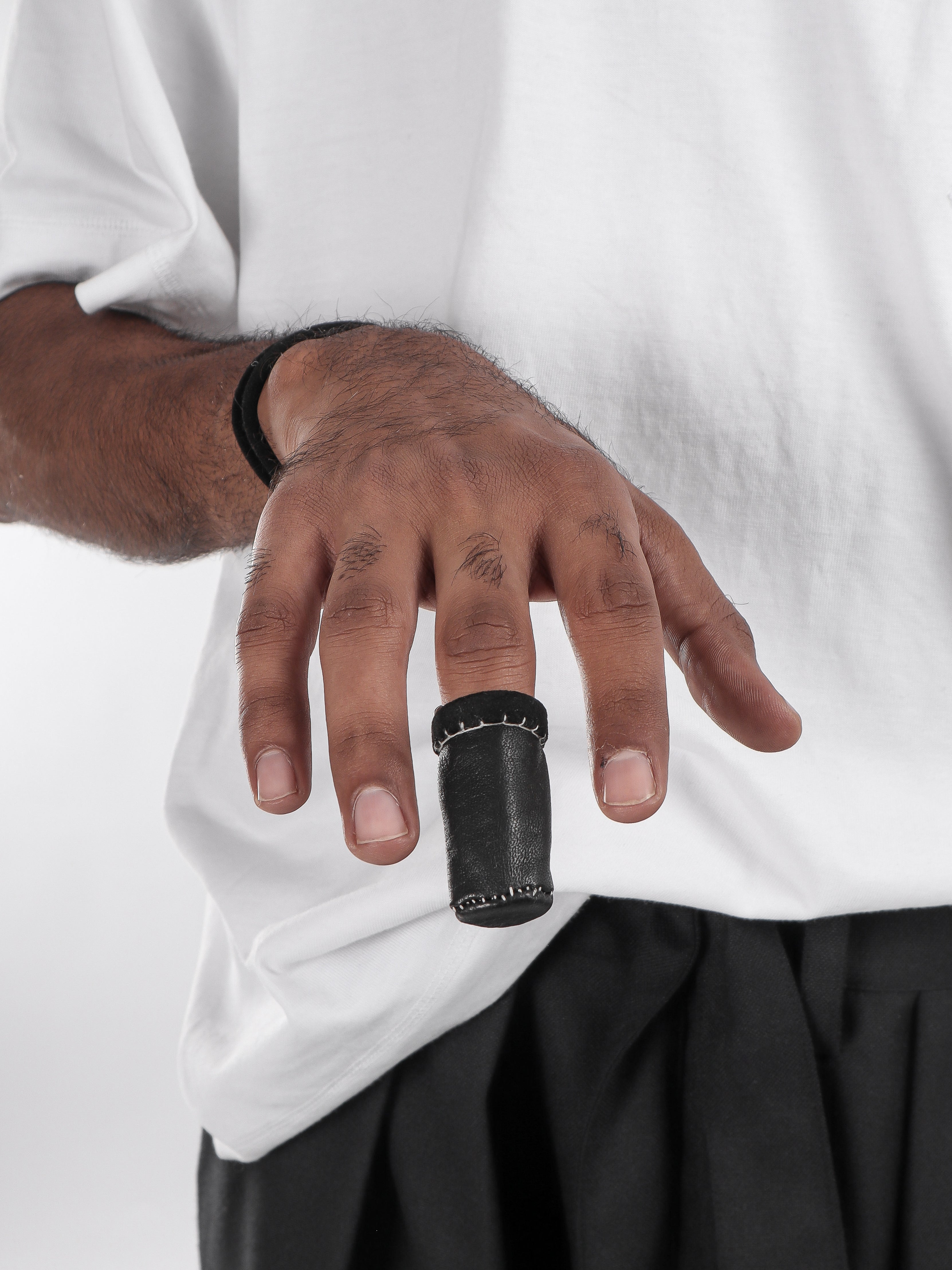 LEATHER THIMBLE PENDANT